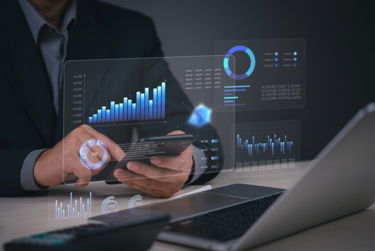 A,Business,Professional,Analyzing,Financial,Data,On,A,Mobile,Device